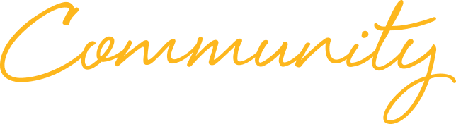 The word Community written in a flowing, yellow cursive font on a light gray background.