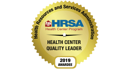 Gold seal with the text Health Resources and Services Administration, HRSA Health Center Program, Health Center Quality Leader, 2019 Awardee.