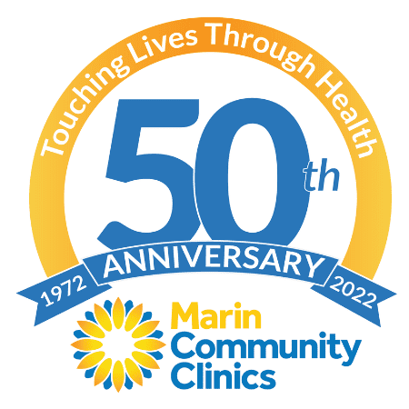 Circular logo for Marin Community Clinics 50th Anniversary (1972-2022) with the slogan Touching Lives Through Health and a yellow and blue sunburst design.