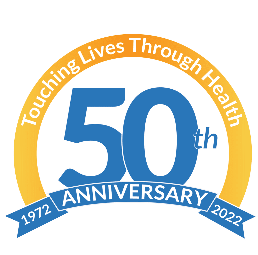 A logo with the text “Touching Lives Through Health” above a large blue “50th,” and a ribbon below reading “ANNIVERSARY 1972 – 2022.”.